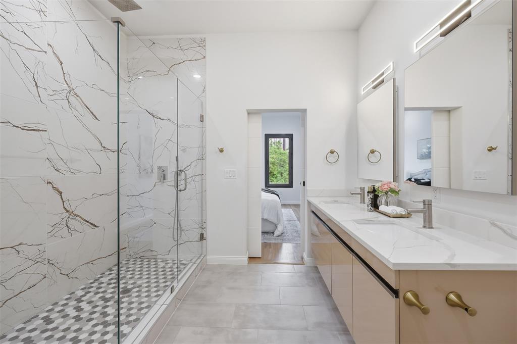 1920 Caddo Street, Unit 204 Dallas, TX 75204 - Photo 22 of 33 a bathroom with a sink a toilet and shower