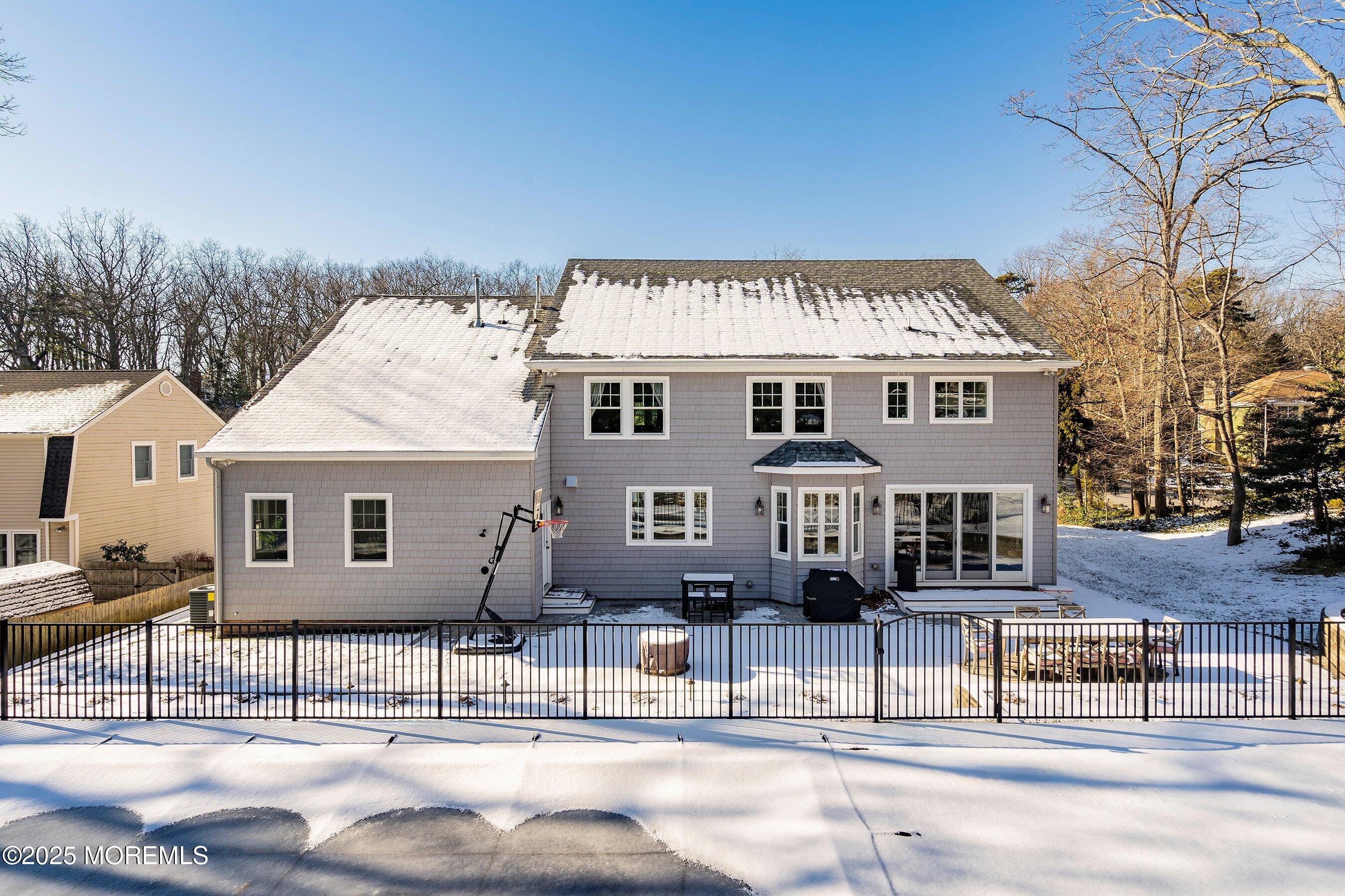 705 Rankin Road Brielle, NJ 08730 - Photo 54 of 58 a front view of a house with a garden