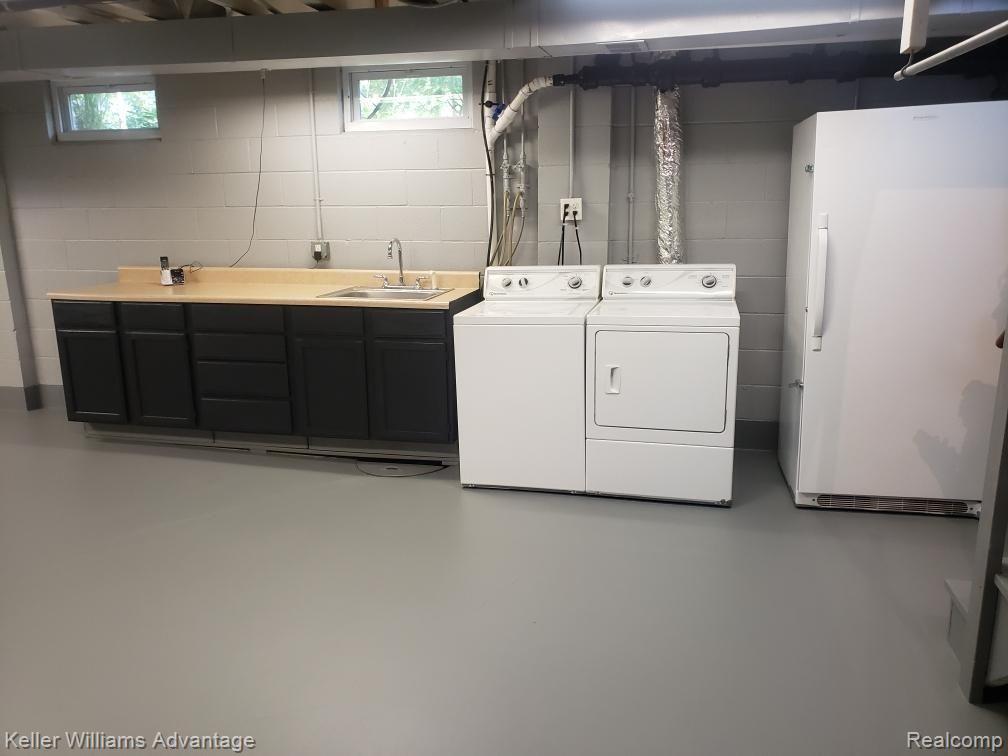 5385 Mack Road Howell, MI 48855 - Photo 36 of 59 Basement laundry area