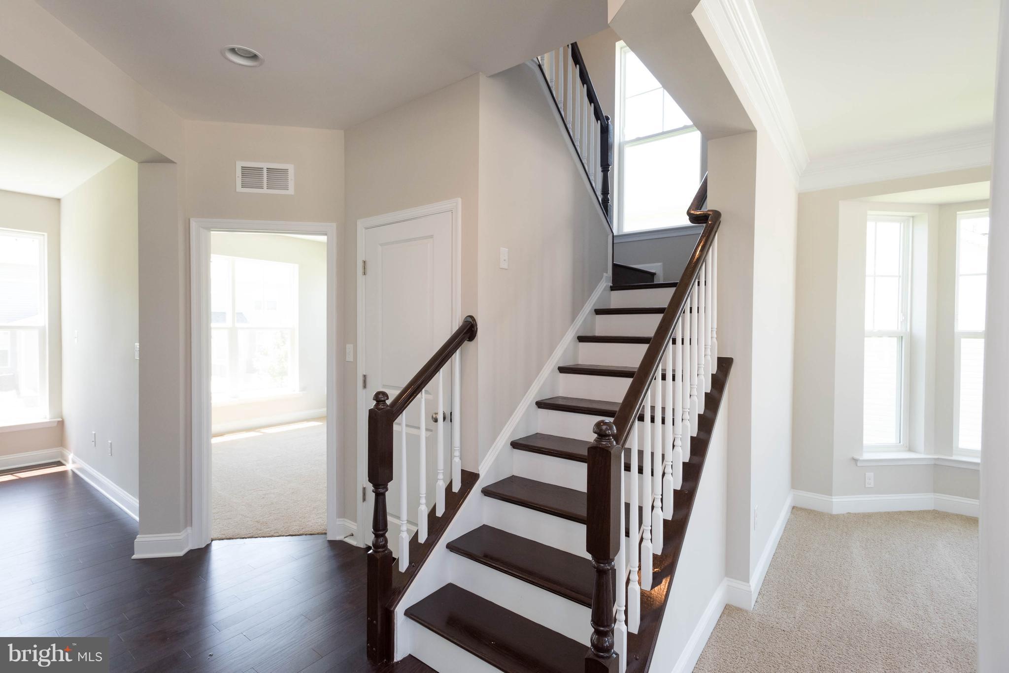 9763 Powder Hall Road Perry Hall, MD 21128 - Photo 2 of 30 a view of an entryway with wooden floor and door
