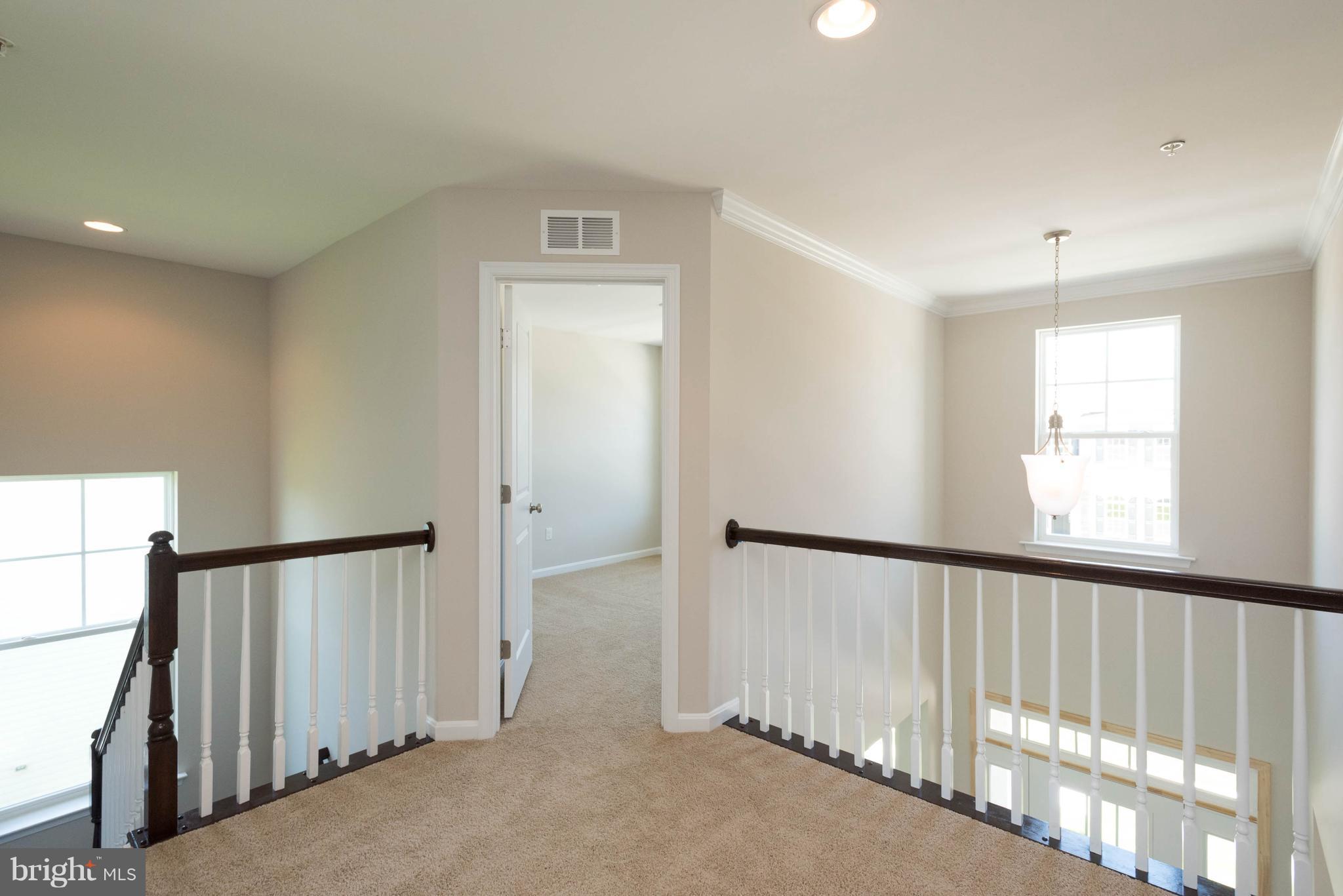 9763 Powder Hall Road Perry Hall, MD 21128 - Photo 15 of 30 a view of a hallway with a window