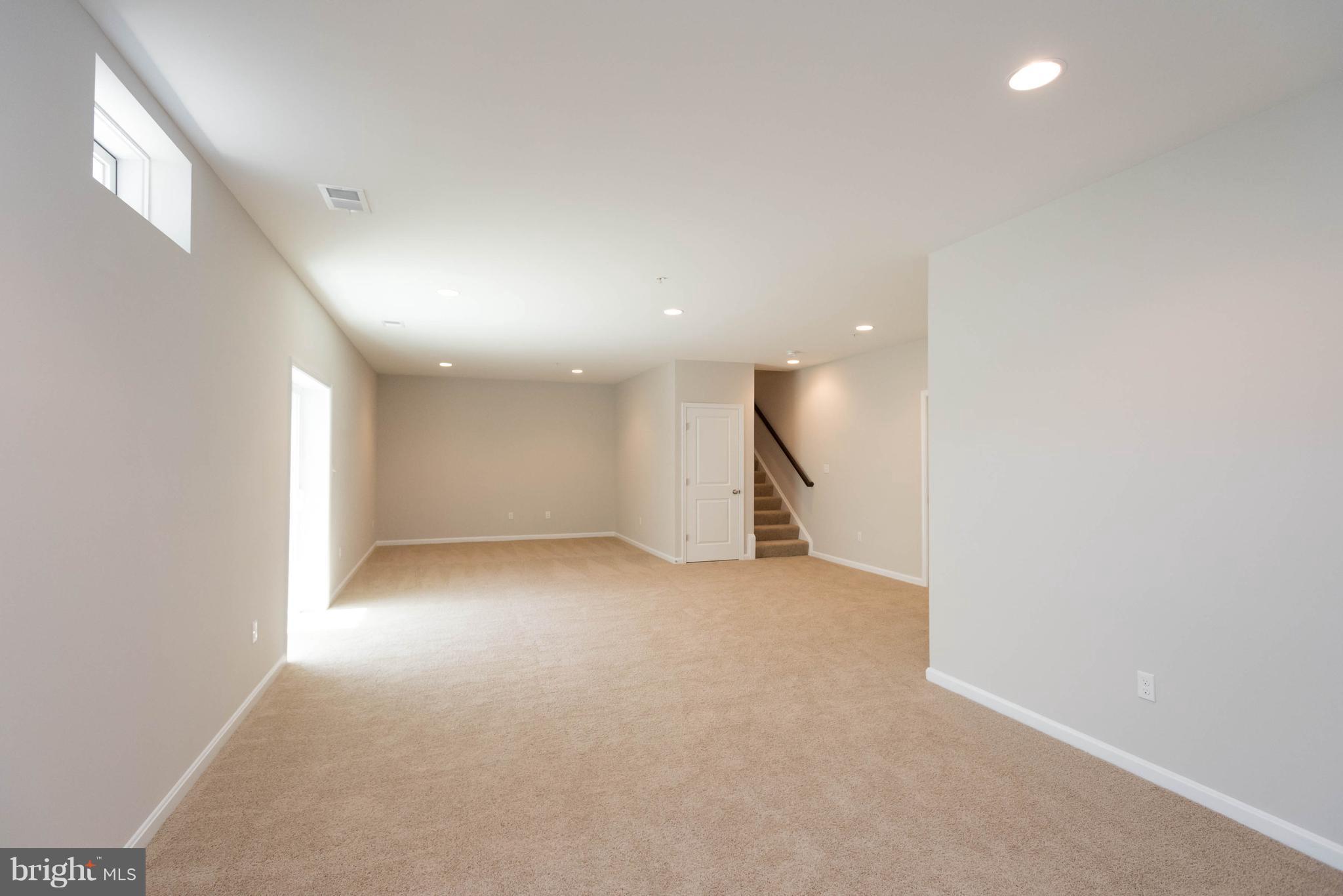 9763 Powder Hall Road Perry Hall, MD 21128 - Photo 28 of 30 an empty room with a kitchen