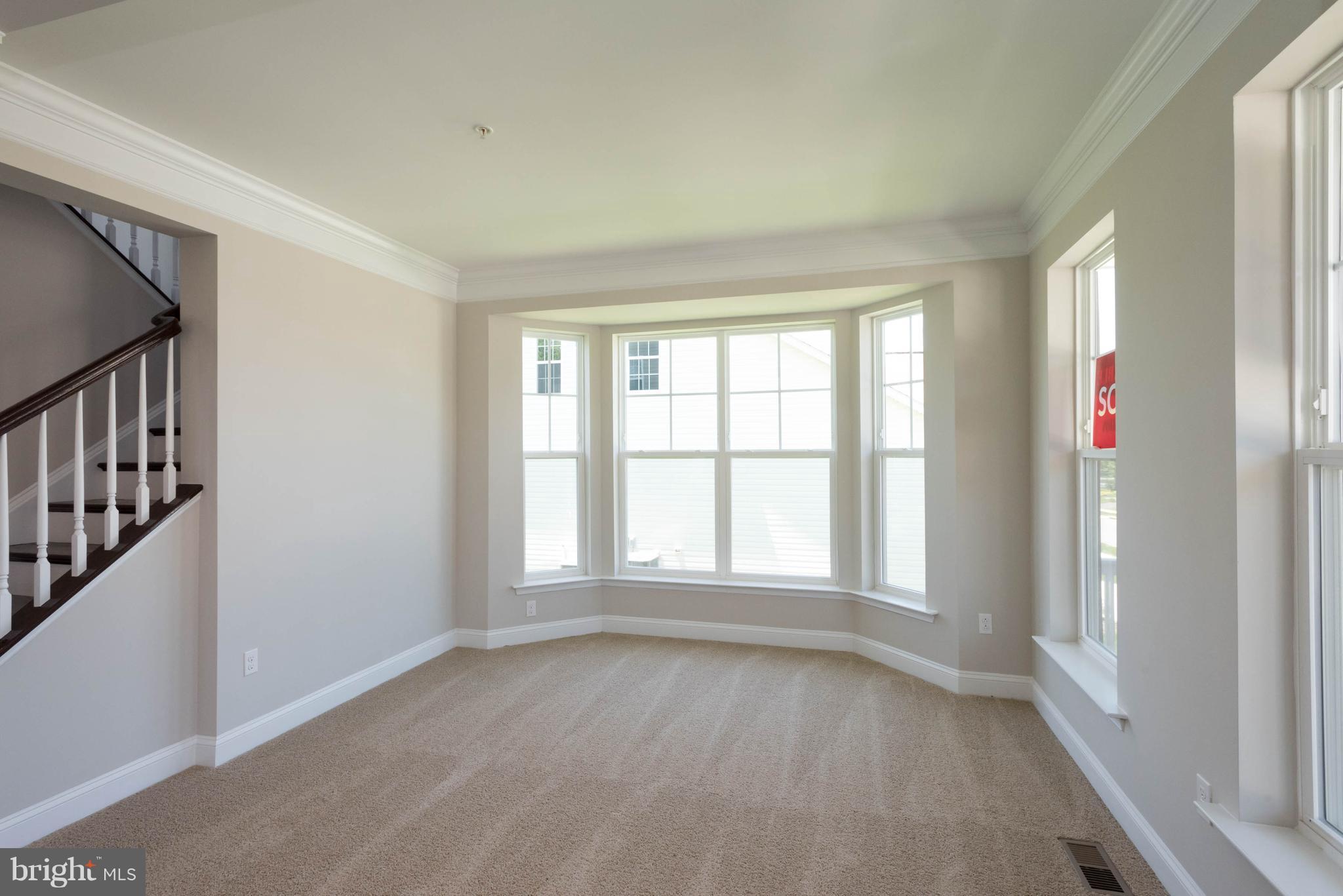 9763 Powder Hall Road Perry Hall, MD 21128 - Photo 4 of 30 a view of an empty room with a window