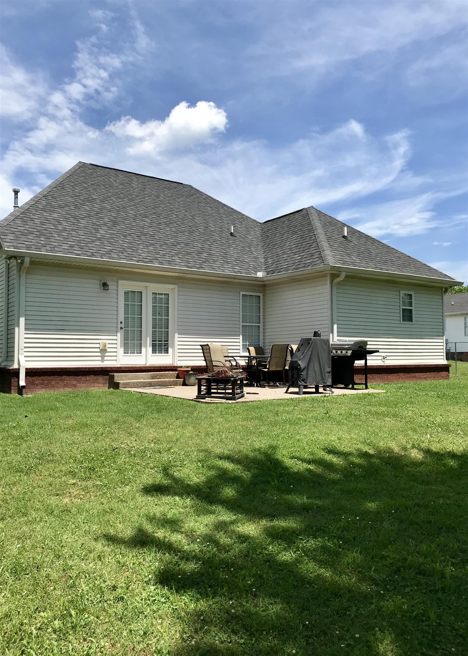 420 Nathan Street Lebanon, TN 37087 - Photo 14 of 14 a backyard of a house with table and chairs