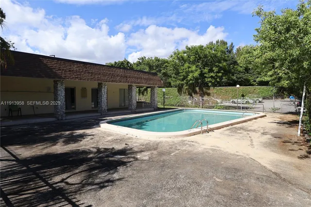 a view of a backyard with a garden