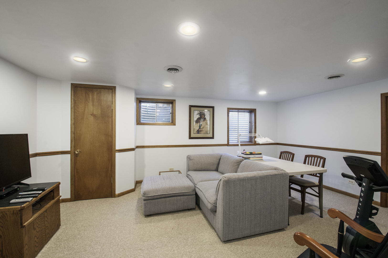1750 Forest Ridge Road St. Charles, IL 60174 - Photo 14 of 22 a living room with furniture and a flat screen tv