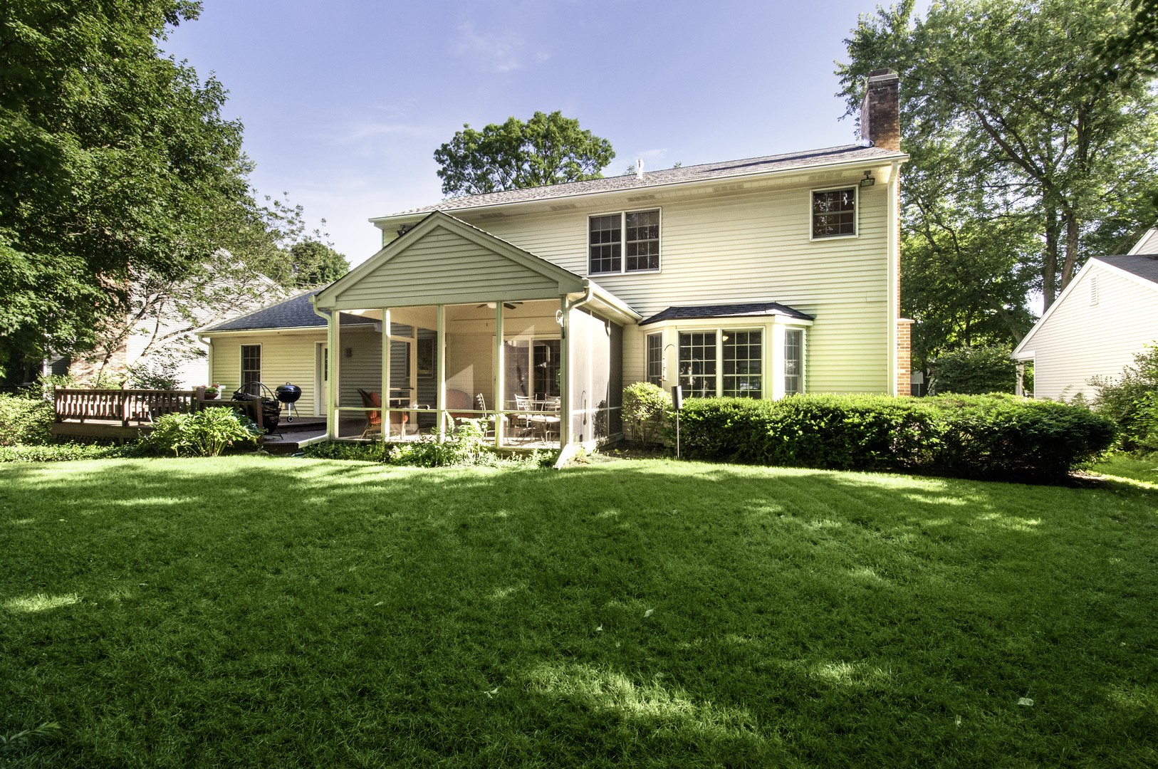 1750 Forest Ridge Road St. Charles, IL 60174 - Photo 2 of 22 a front view of a house with a yard porch and furniture