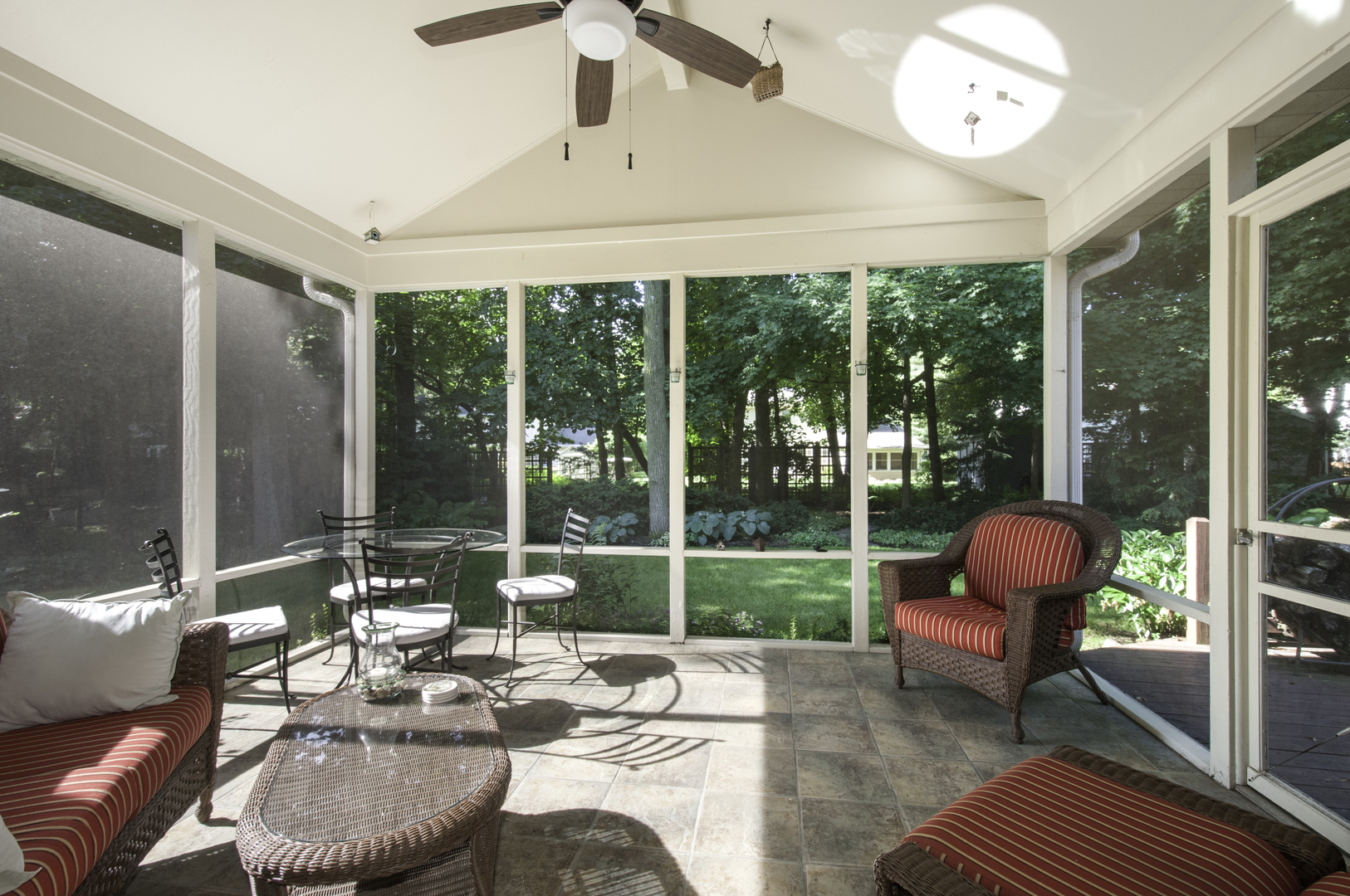 1750 Forest Ridge Road St. Charles, IL 60174 - Photo 22 of 22 a living room with patio furniture and a floor to ceiling window