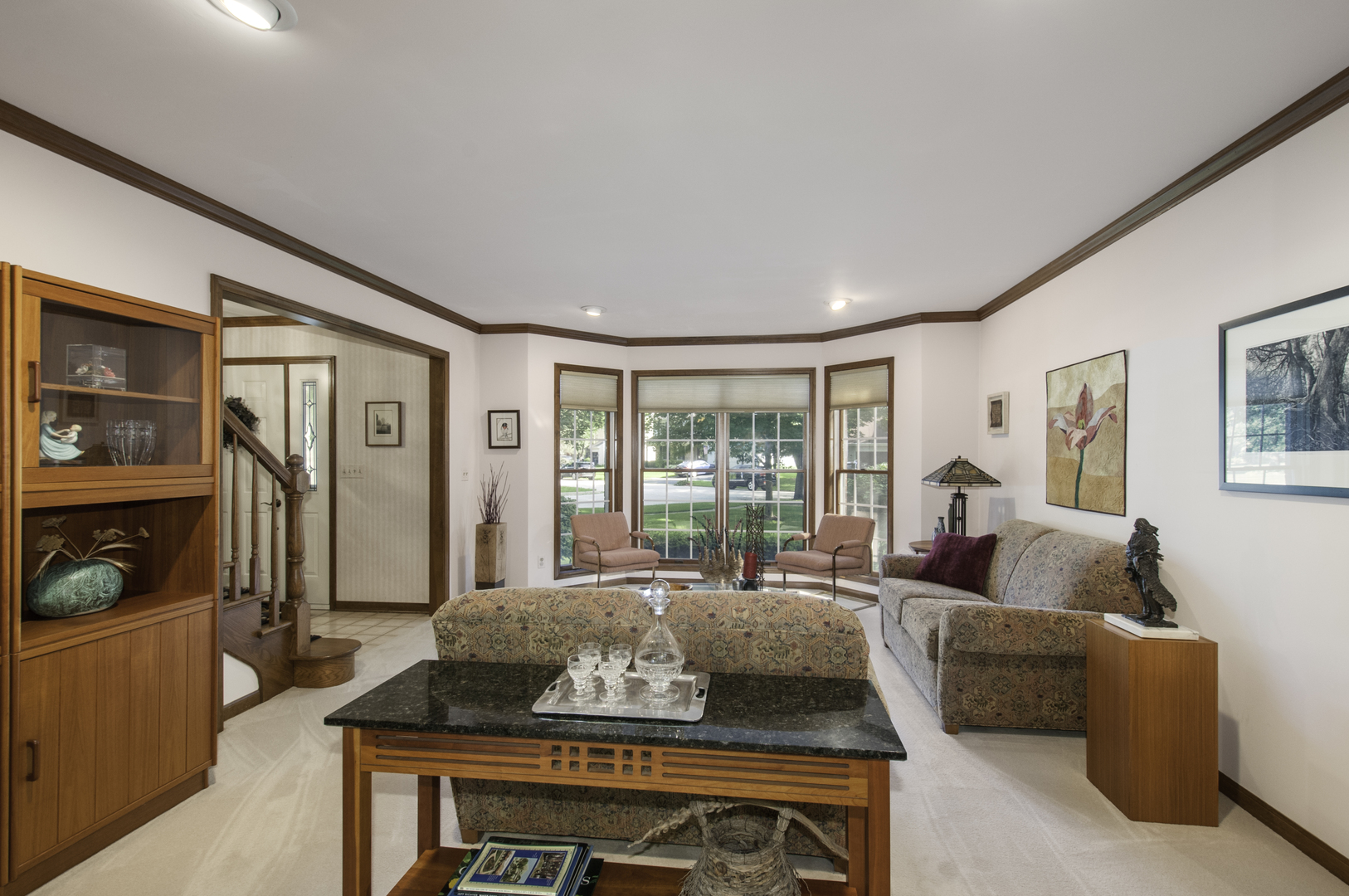 1750 Forest Ridge Road St. Charles, IL 60174 - Photo 9 of 22 a living room with furniture and a window with wooden floor