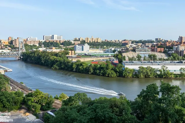 a view of a city with tall buildings