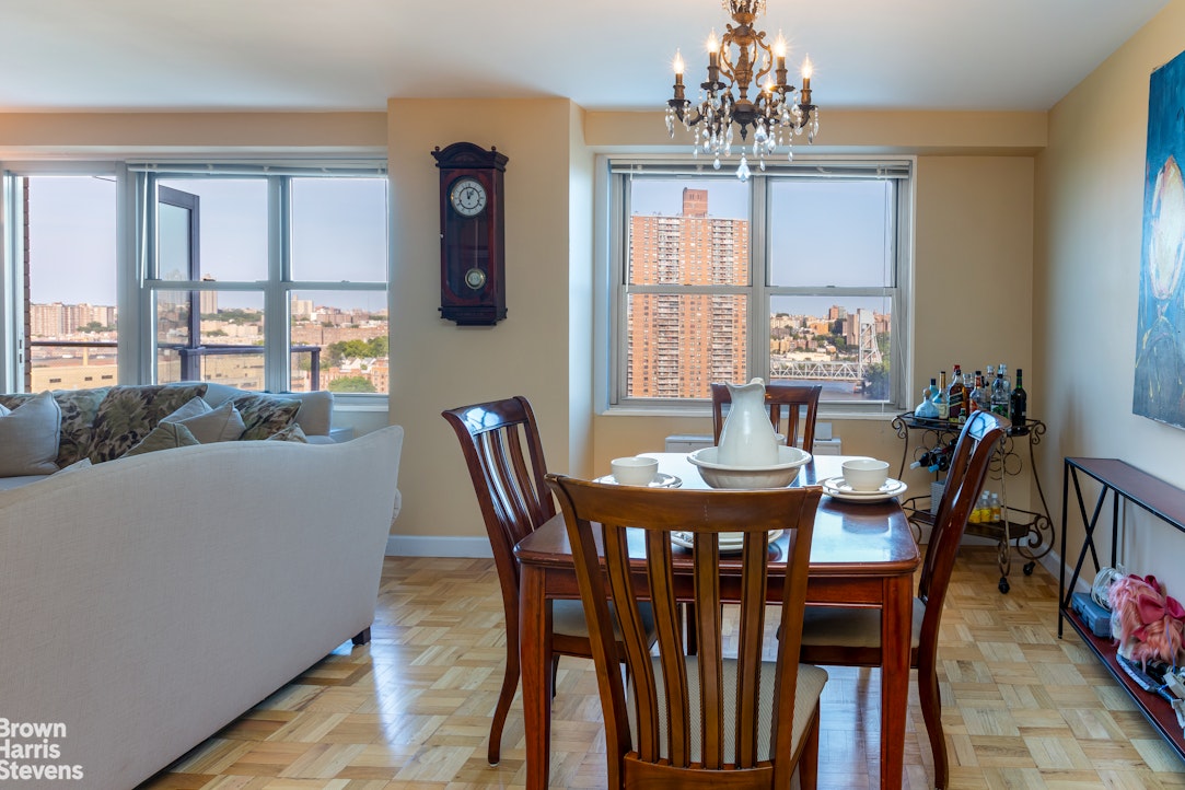 2500 Johnson Avenue, Unit 9P Bronx, NY 10463 - Photo 5 of 21 a view of a dining room with furniture window and outside view