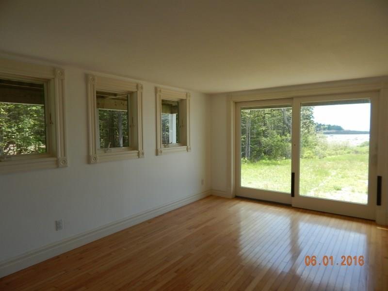 205 Deep Cove Road Winter Harbor, ME 04693 - Photo 16 of 25 This is the lower level bedroom...