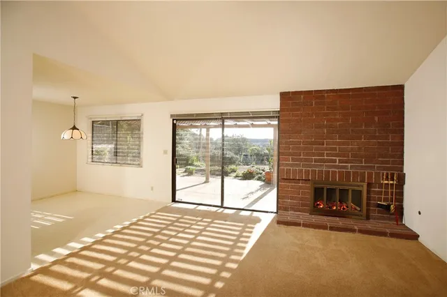 a view of a livingroom with a fireplace
