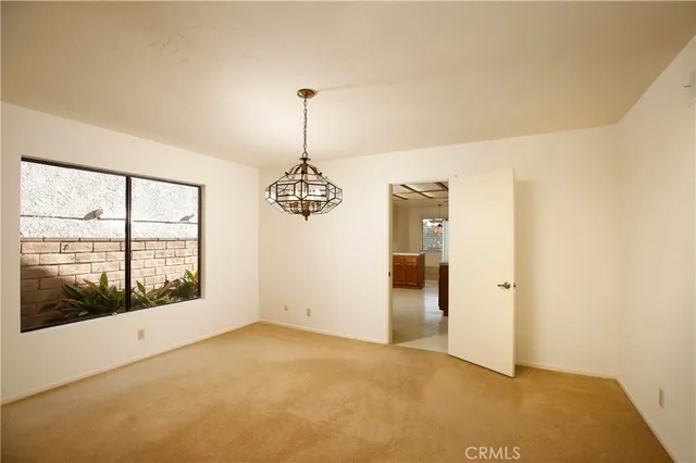 a view of empty room with windows