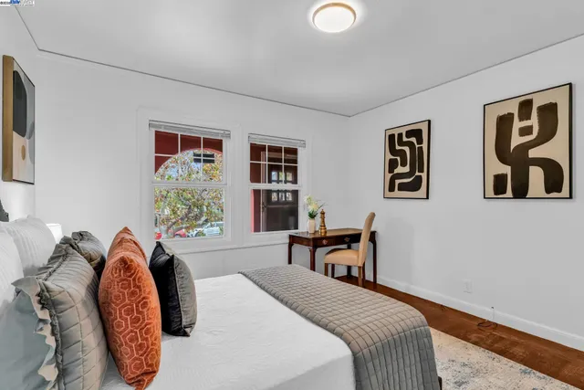 a view of a patio with a table and chairs