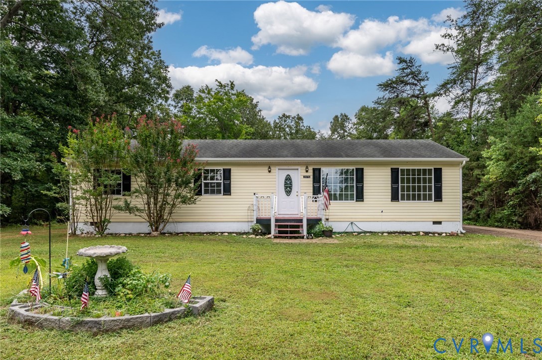 2876 Doctors Road Louisa, VA 23093 - Photo 2 of 36 a view of a house with a yard and sitting area