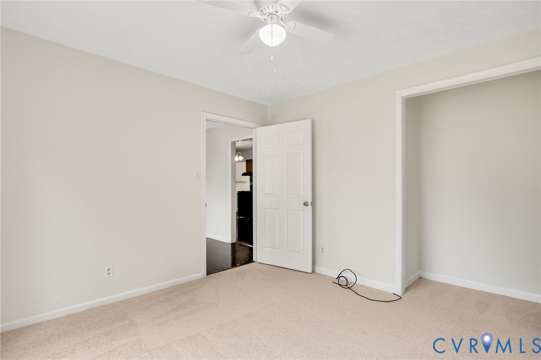 2876 Doctors Road Louisa, VA 23093 - Photo 8 of 36 a view of an empty room with a ceiling fan