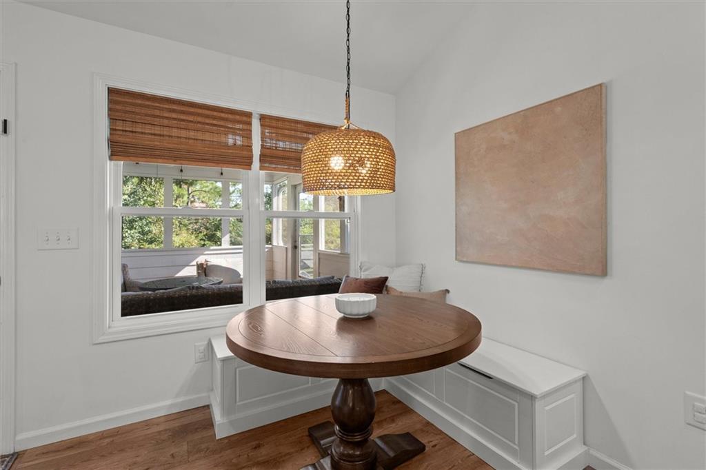 167 Lawrence Drive Villa Rica, GA 30180 - Photo 19 of 43 a view of a dining room with furniture window and wooden floor
