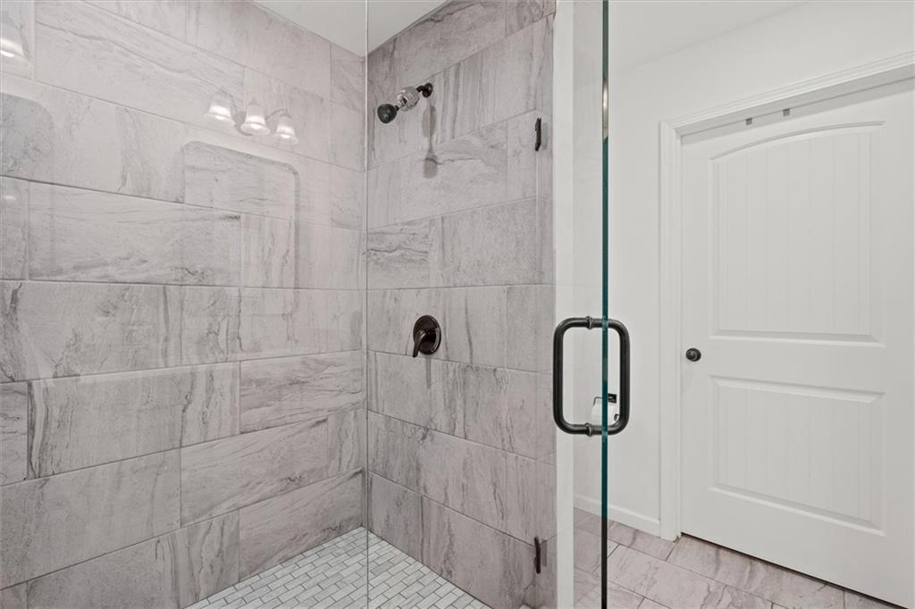 167 Lawrence Drive Villa Rica, GA 30180 - Photo 25 of 43 a bathroom with a shower