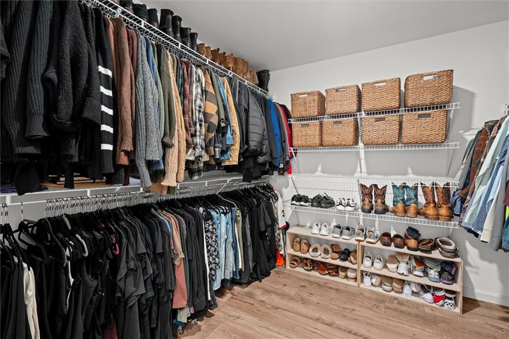 167 Lawrence Drive Villa Rica, GA 30180 - Photo 26 of 43 a view of walk in closet with clothes and shoes