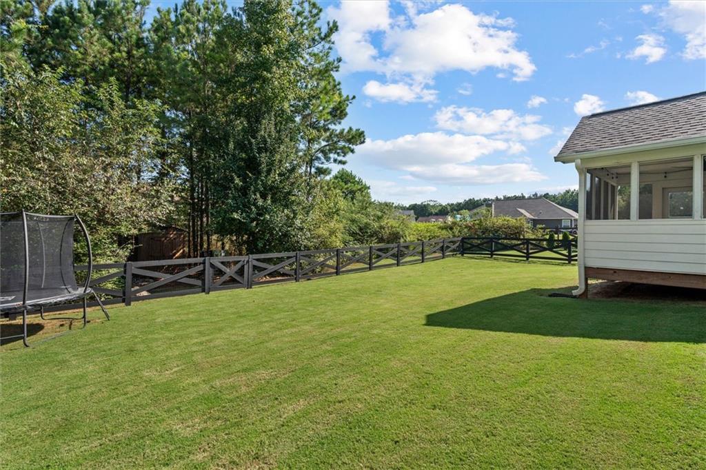167 Lawrence Drive Villa Rica, GA 30180 - Photo 40 of 43 a view of a house with a yard