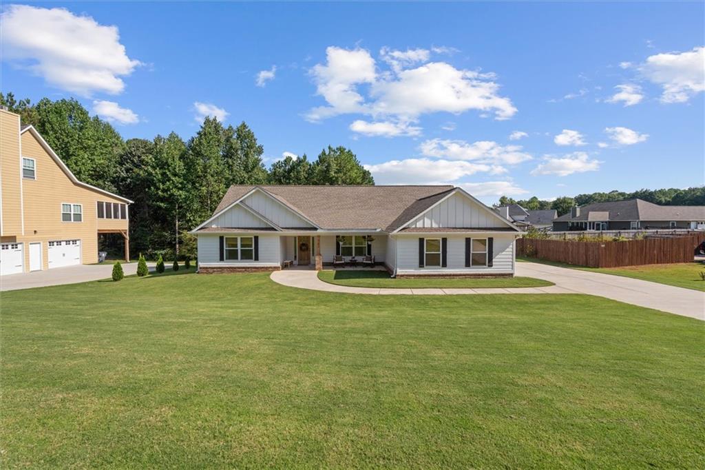 167 Lawrence Drive Villa Rica, GA 30180 - Photo 6 of 43 a front view of a house with garden