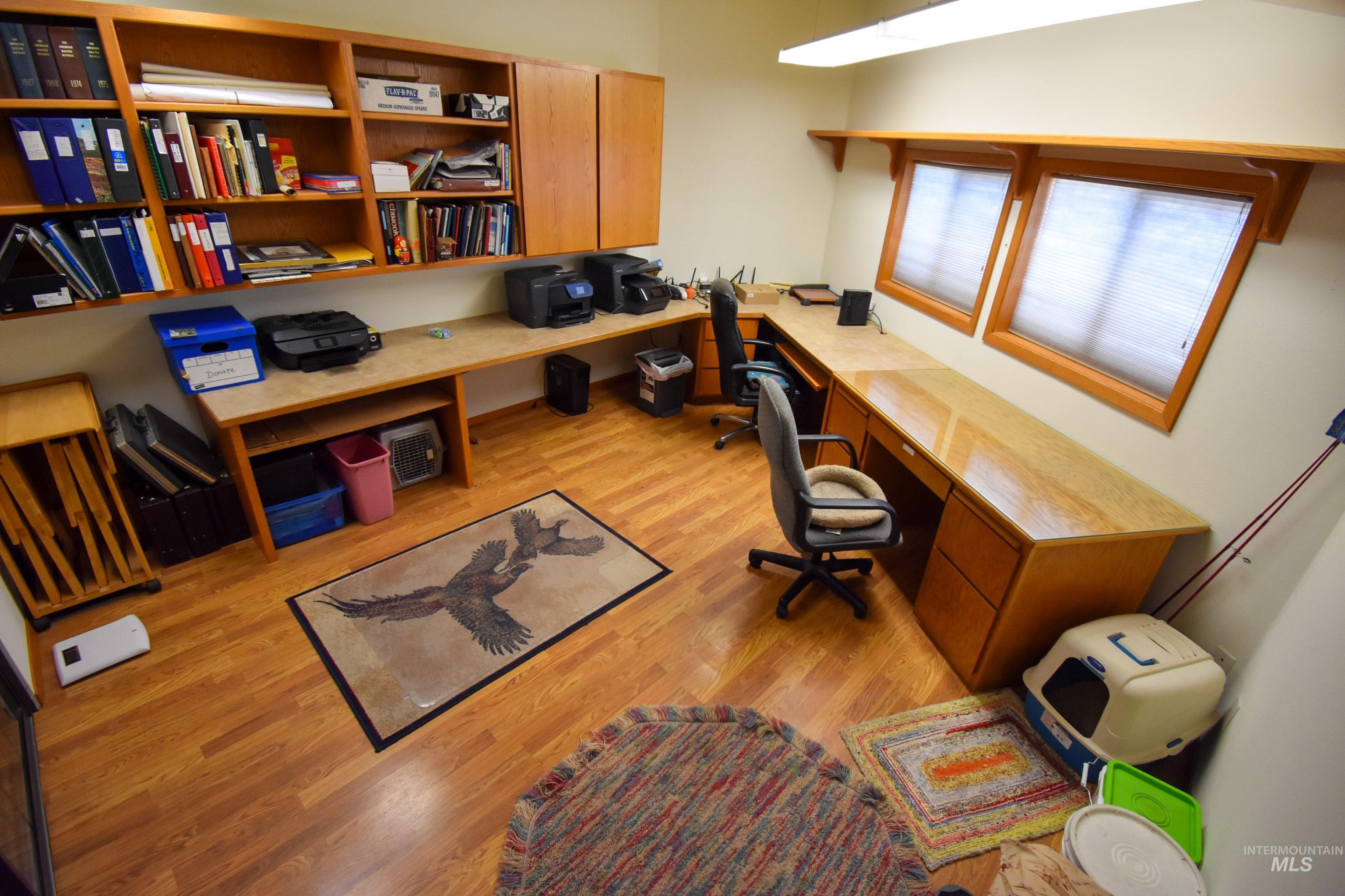 209 Harding Street Asotin, WA 99402 - Photo 12 of 29 Home office featuring wood finished floors and built in study area