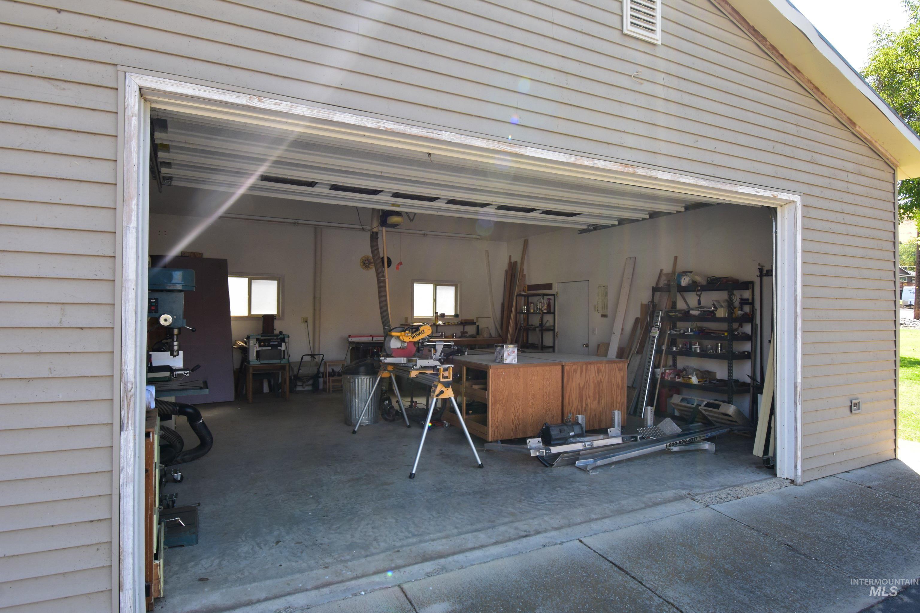 209 Harding Street Asotin, WA 99402 - Photo 19 of 29 Garage featuring driveway