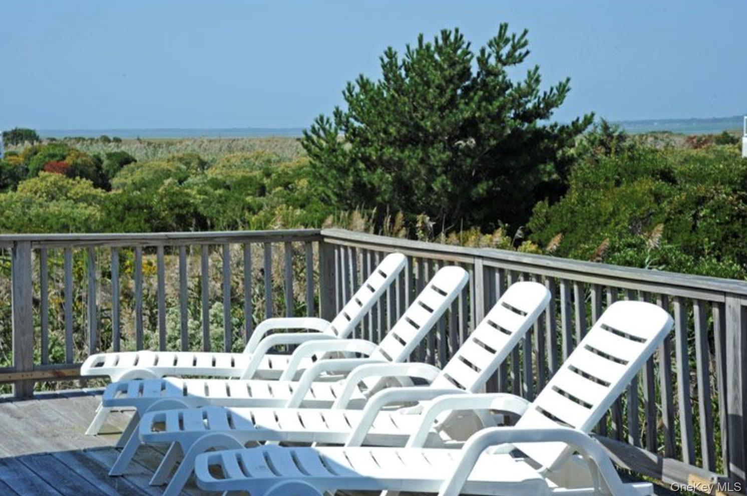 900 Dune Road Westhampton Beach, NY 11978 - Photo 11 of 14 a view of balcony with furniture