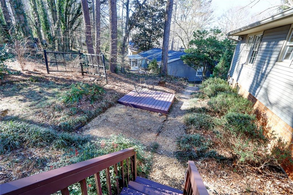 253 Newport Road Southwest Lilburn, GA 30047 - Photo 23 of 40 a view of a back yard of the house