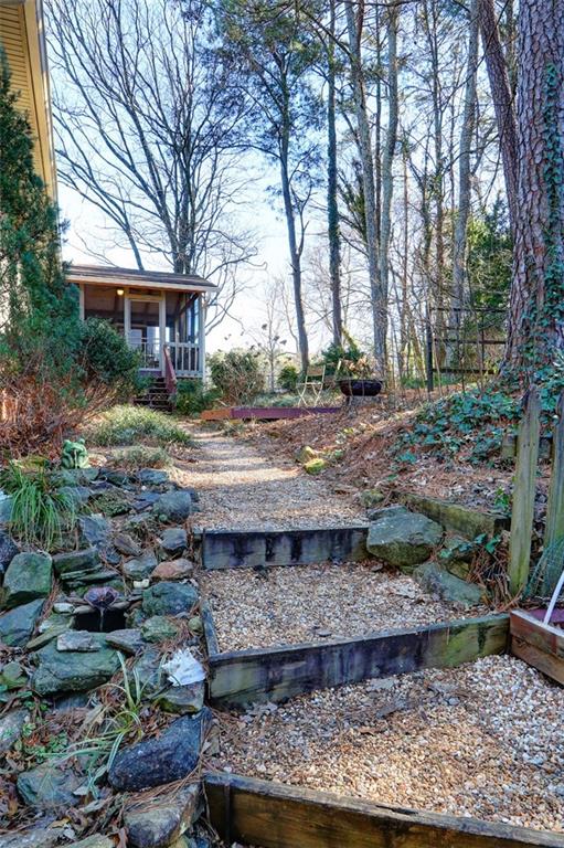 253 Newport Road Southwest Lilburn, GA 30047 - Photo 24 of 40 a view of a yard and tree s