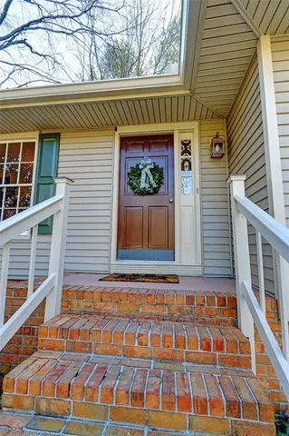 a front view of a house with a garage
