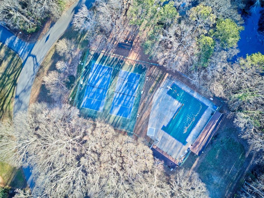 253 Newport Road Southwest Lilburn, GA 30047 - Photo 35 of 40 a view of a bench in a yard