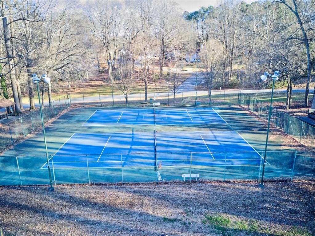 253 Newport Road Southwest Lilburn, GA 30047 - Photo 37 of 40 a view of outdoor space with deck and yard