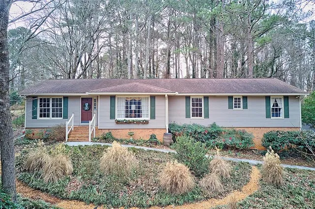 front view of a house with a yard