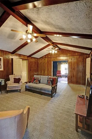 a view of a balcony with wooden floor