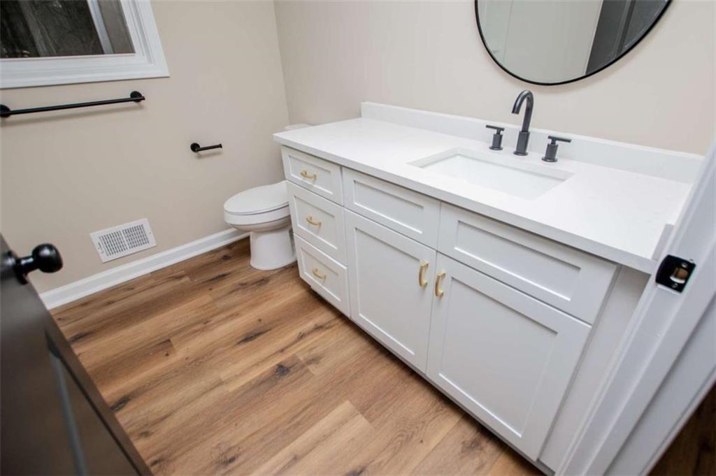 757 North Burnt Hickory Road Douglasville, GA 30134 - Photo 23 of 51 a bathroom with a sink and a mirror