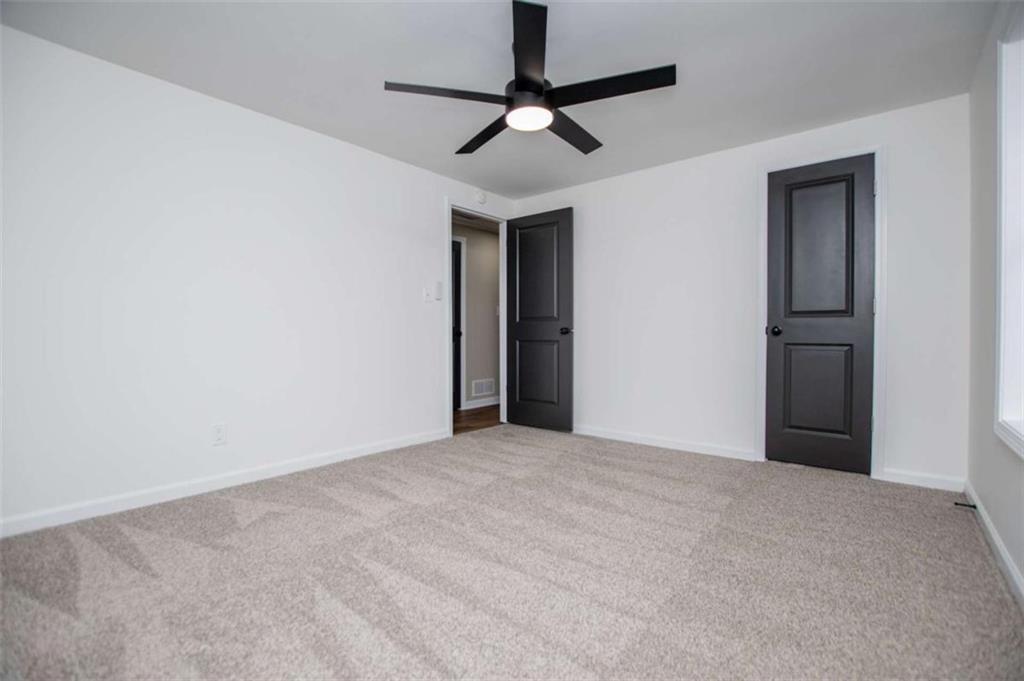 757 North Burnt Hickory Road Douglasville, GA 30134 - Photo 26 of 51 a view of a room with a ceiling fan