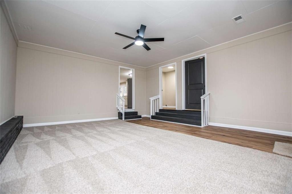 757 North Burnt Hickory Road Douglasville, GA 30134 - Photo 37 of 51 a view of empty room with ceiling fan