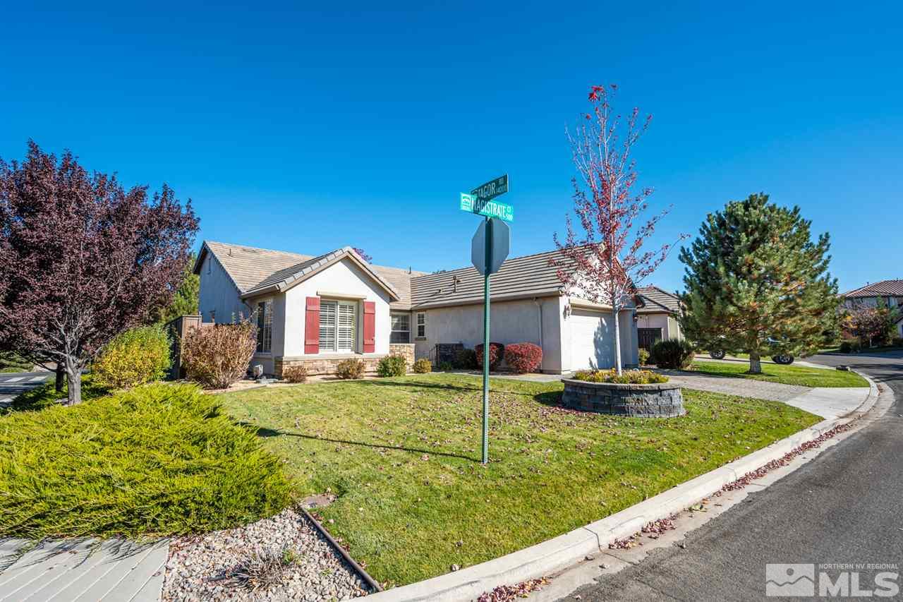 515 Magistrate Court Reno, NV 89521 - Photo 3 of 21 a front view of a house with garden