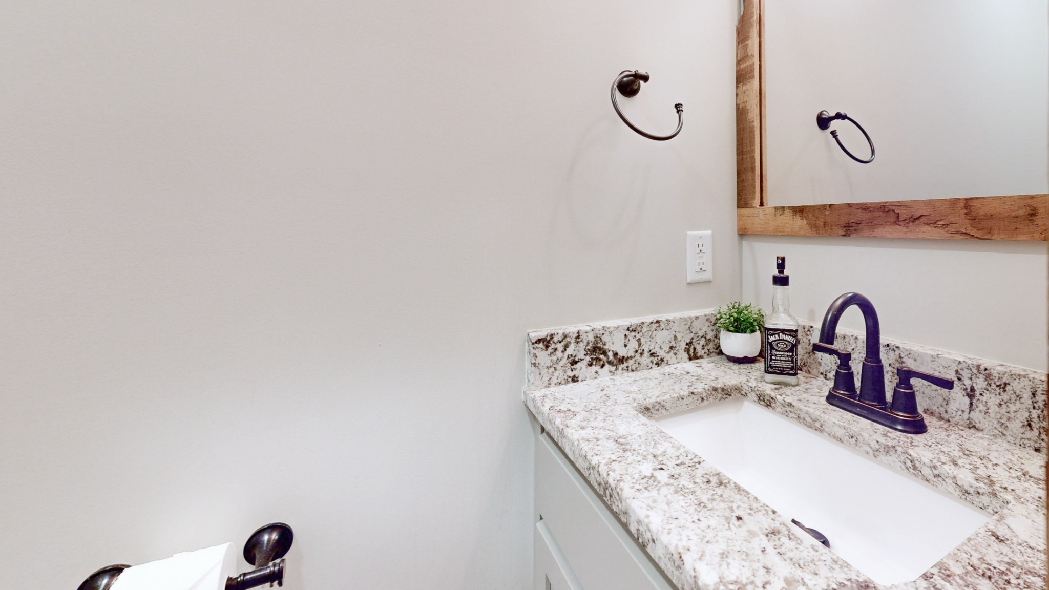 601 King Ridge Road Dowelltown, TN 37059 - Photo 21 of 49 a bathroom with a granite countertop sink and a mirror