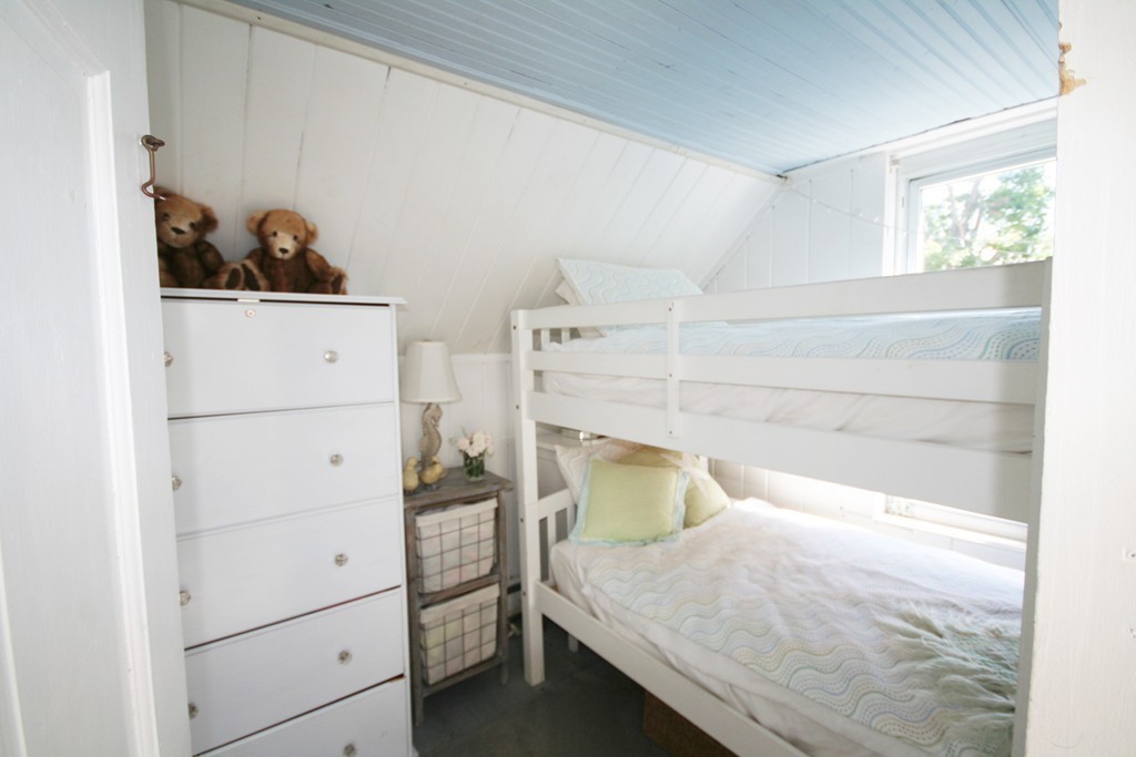 20 Bacon Road Weymouth, MA 02191 - Photo 13 of 26 a bedroom with a bed and utility room