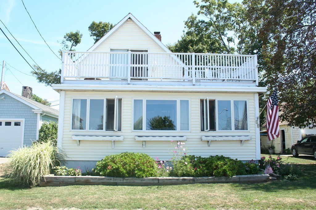 20 Bacon Road Weymouth, MA 02191 - Photo 22 of 26 a front view of a house with a yard