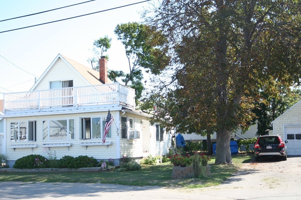 20 Bacon Road Weymouth, MA 02191 - Photo 23 of 26 a front view of a house with a yard