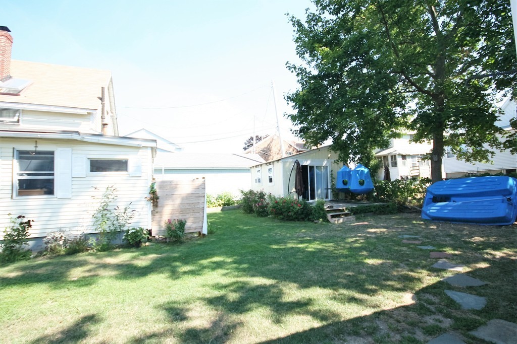 20 Bacon Road Weymouth, MA 02191 - Photo 24 of 26 a view of a house with backyard