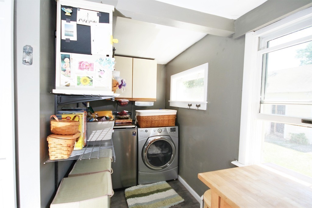 20 Bacon Road Weymouth, MA 02191 - Photo 6 of 26 a utility room with dryer and washer