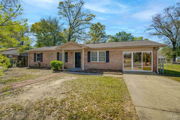 front view of a house with a patio