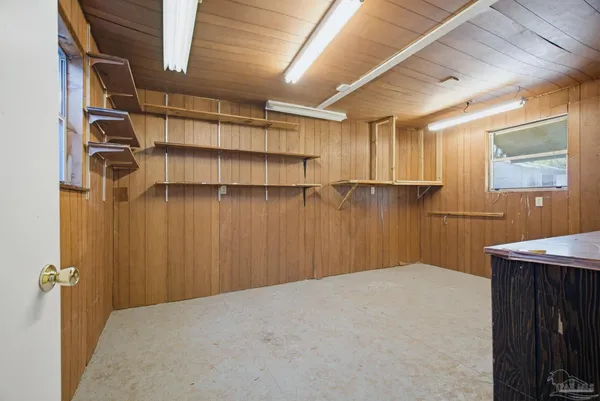 a view of a room that has a large window