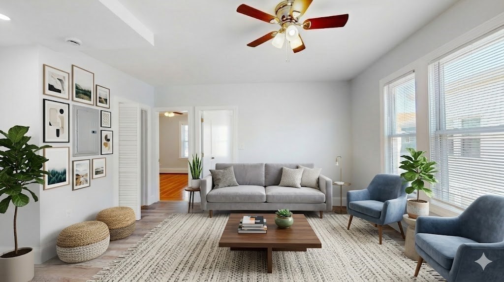5 Ropes Street, Unit 2 Salem, MA 01970 - Photo 1 of 8 a living room with furniture and a potted plant
