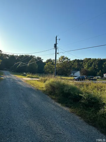 a view of a lake with a big yard